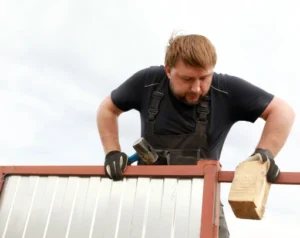 repairing-fence-near-house
