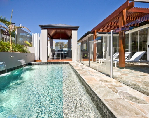 swimming-pool-with-glass-fence-and-timber-gazebo